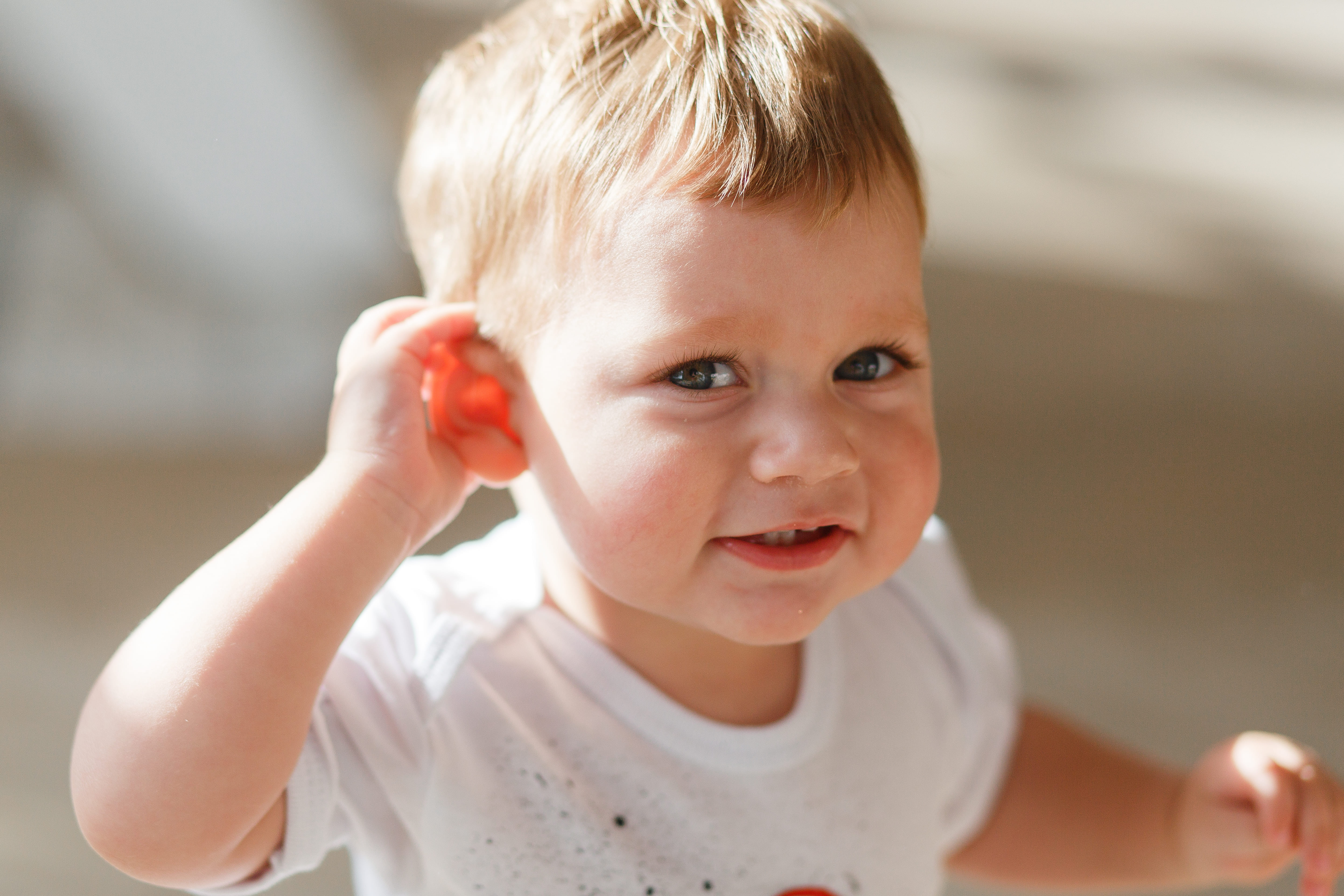 baby-boy-listens-put-hand-his-ear.jpg