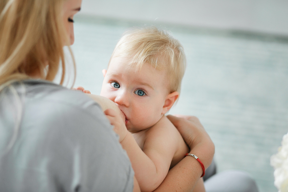 woman-breastfeeding-little-baby-mother-with-her-newborn-daughter.jpg